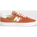 Przecenione Pomarańczowe Sneakersy sznurowane męskie amortyzujące z zamszu marki New Balance w rozmiarze 45 