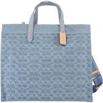 Niebieskie Shopper bags damskie z odpinanym paskiem w nowoczesnym stylu dżinsowe marki Coach 