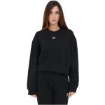 Czarne Swetry oversize damskie do prania w pralce gładkie w stylu casual polarowe z okrągłym dekoltem na jesień marki adidas w rozmiarze L 