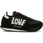 Czarne Sneakersy na koturnie damskie - rodzaj noska: Okrągły z zamszu na wiosnę marki MOSCHINO w rozmiarze 38 