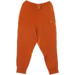 Pomarańczowe Spodnie dresowe męskie sportowe marki Nike w rozmiarze XL 