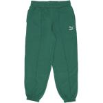 Zielone Spodnie dresowe damskie luźne marki Puma w rozmiarze M 