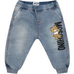 Niebieskie Jeansy dziecięce dla niemowląt dżinsowe marki MOSCHINO - wiek: 0-6 miesięcy 