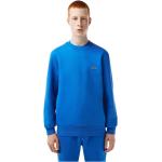 Niebieskie Swetry męskie haftowane marki Lacoste w rozmiarze XL 