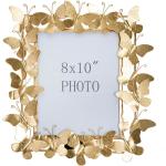 Złote Stojące ramki do zdjęć z motywem motyli marki mauro ferretti w rozmiarze 20x25 cm 