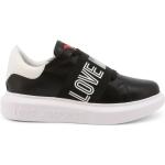 Czarne Sneakersy na koturnie damskie syntetyczne na jesień marki MOSCHINO w rozmiarze 39 - wysokość obcasa od 3cm do 5cm 
