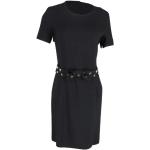 Czarne Krótkie sukienki damskie z ćwiekami w stylu vintage marki MOSCHINO w rozmiarze M 