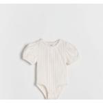 Białe Body dziecięce z krótkim rękawem bawełniane marki Reserved w rozmiarze 98 - wiek: 2-3 lata 