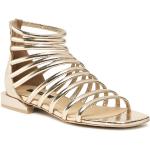 Złote Sandały skórzane damskie z gładkiej skóry na lato marki Gino Rossi w rozmiarze 39 