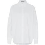 Białe Bluzki oversize damskie z długimi rękawami eleganckie bawełniane marki Drykorn w rozmiarze XL 