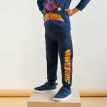 Granatowe Spodnie dziecięce dresowe dla chłopców dżinsowe marki Sinsay w rozmiarze 98 Superman 