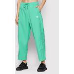 Przecenione Zielone Spodnie dresowe damskie sportowe marki adidas w rozmiarze M 