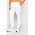 Przecenione Białe Spodnie dresowe męskie rurki marki Guess w rozmiarze L 