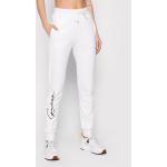 Przecenione Białe Spodnie dresowe damskie sportowe marki Guess w rozmiarze L 