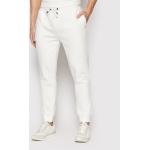 Przecenione Białe Spodnie dresowe męskie marki Guess w rozmiarze XL 