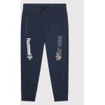 Przecenione Granatowe Spodnie dziecięce dresowe marki Hummel w rozmiarze 110 