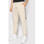 Przecenione Beżowe Spodnie dresowe męskie marki Jack & Jones w rozmiarze XL 