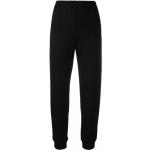 Czarne Spodnie dresowe długie damskie sportowe marki MOSCHINO w rozmiarze S 