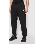 Przecenione Czarne Spodnie dresowe męskie metaliczne marki Tommy Hilfiger TOMMY JEANS w rozmiarze L 
