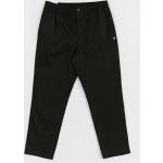 Czarne Spodnie męskie marki New Balance w rozmiarze M 