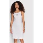 Przecenione Białe Sukienki plażowe damskie marki Calvin Klein Swimwear w rozmiarze L 