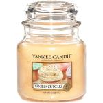 Żółte Świece zapachowe marki Yankee Candle o wysokości 65 cm 