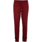 Czerwone Spodnie dresowe męskie marki Tommy Hilfiger w rozmiarze L 