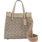 Beżowe Shopper bags damskie z motywem eleganckie z tkaniny marki Coach 