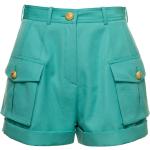 Zielone Krótkie spodnie damskie z kamieniami na lato marki BALMAIN w rozmiarze XS 